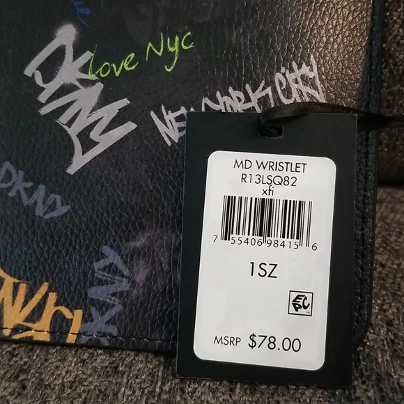 Nwt DKNY medium black graffiti wristlet. Retails $78 - Picture 9 of 9